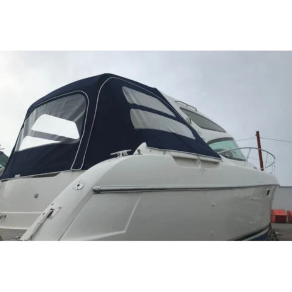 Blue boat canopy on a Jeanneau Prestige 34, seen from the stern.