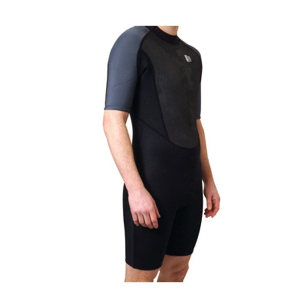 1852 kort våtdräkt för junior i svart och grått, visad framifrån med fokus på bröstpanelen i Glideskin och den sportiga designen.