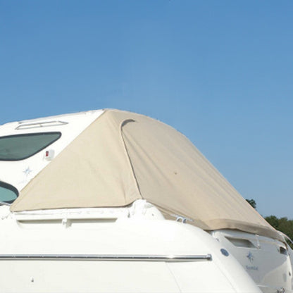 Beige havnekaleche, der dækker cockpittet på en Jeanneau Prestige 34.