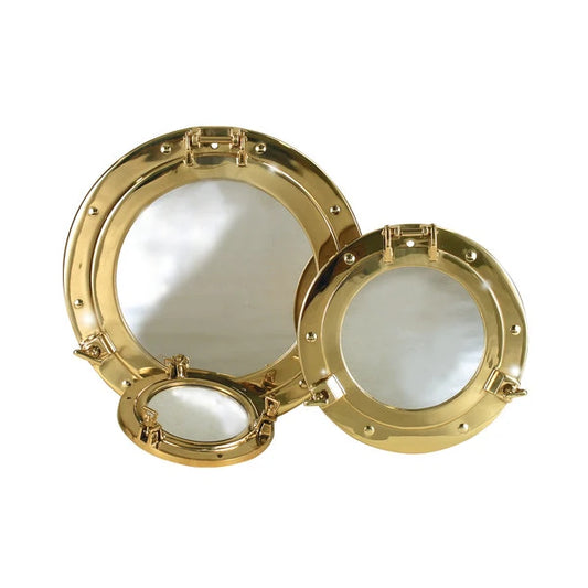 Spegel i marin design som ser ut som en hyttventil